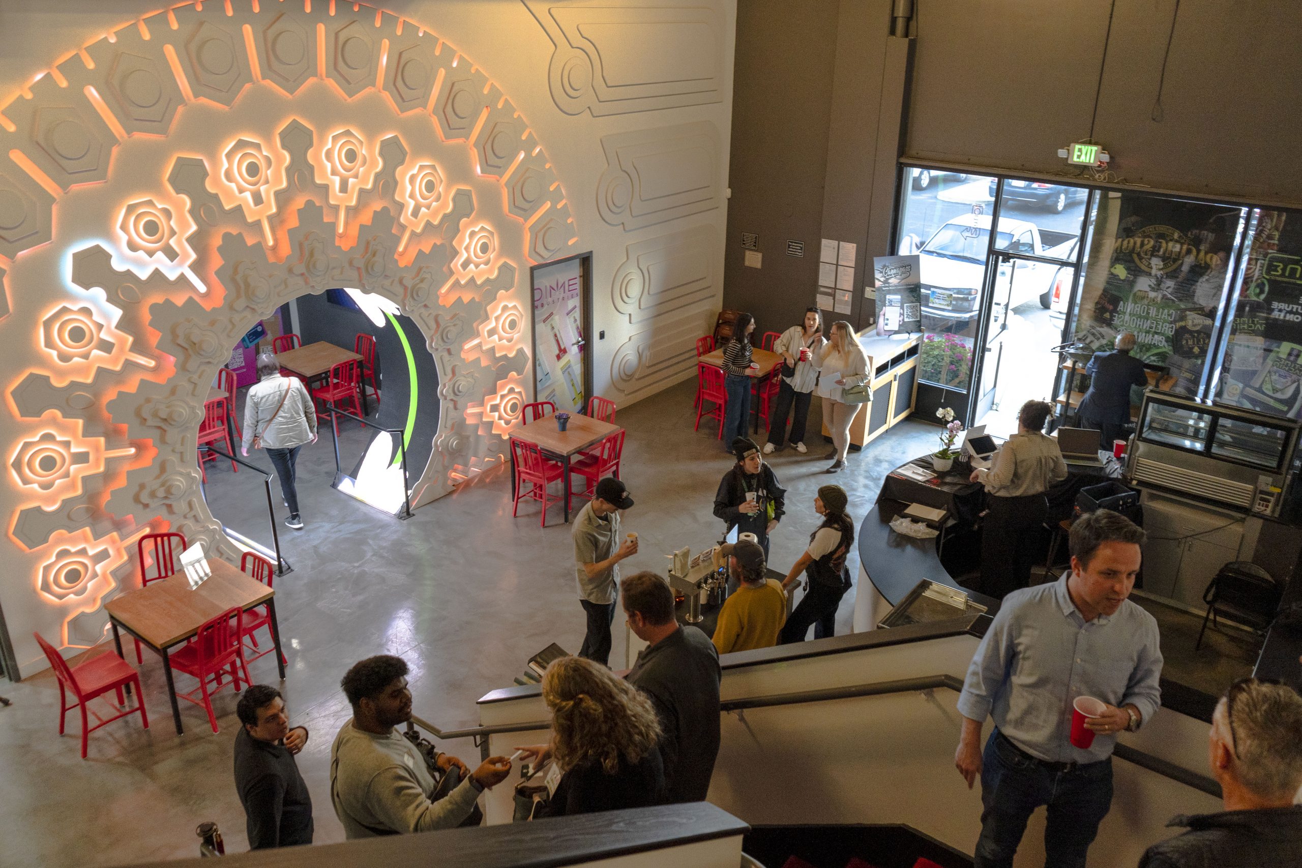 The portal and cafe bustling with people.