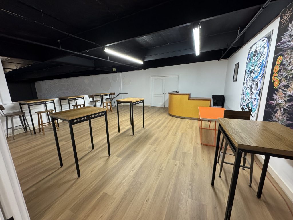 Tables and the bar in one of The Upstairs rooms.